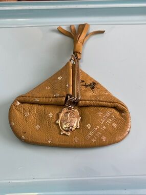 Metallic Gold Mini Coin Pouch with Tassel and Crest Charm